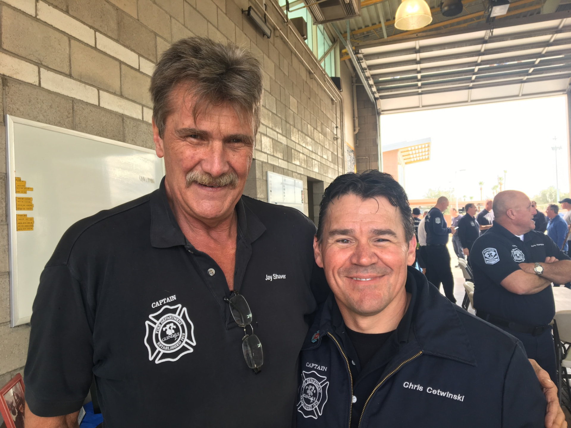 Two Glendale fire captains at a department gathering